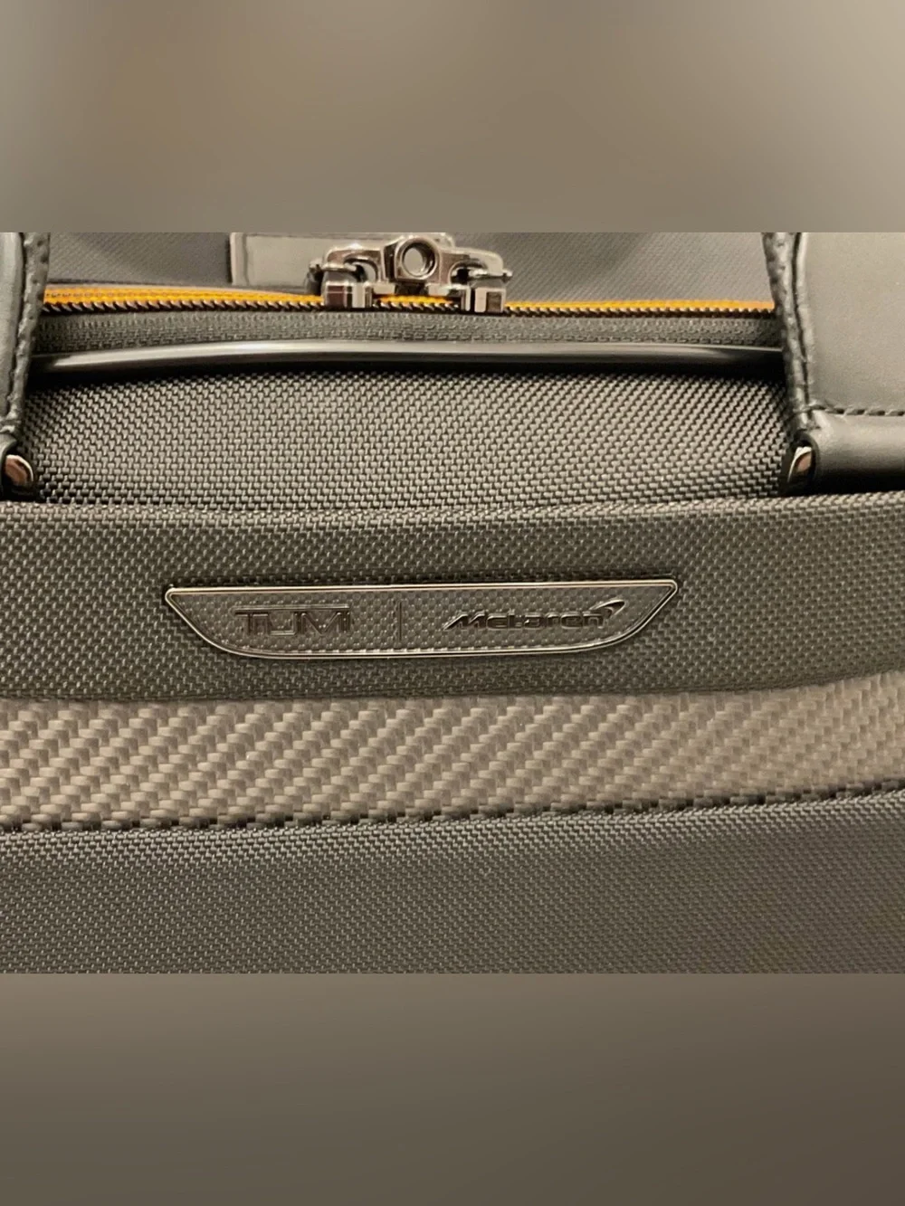 NEW Tumi McLaren QUANTUM 21.5” Duffel Bag - BLACK with PAPAYA ORANGE Accents